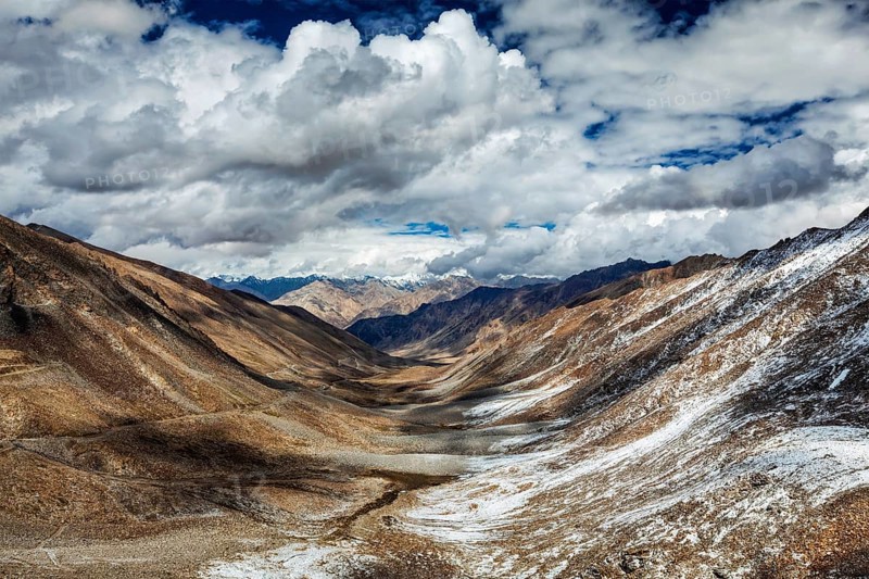 Valley and Karakorum Range on horizon. View from Khardung La pass
