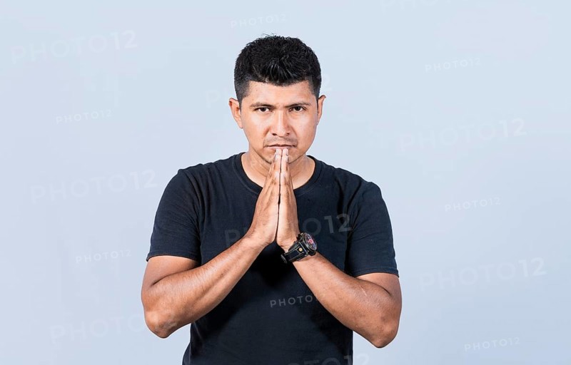 People putting hands together asking please