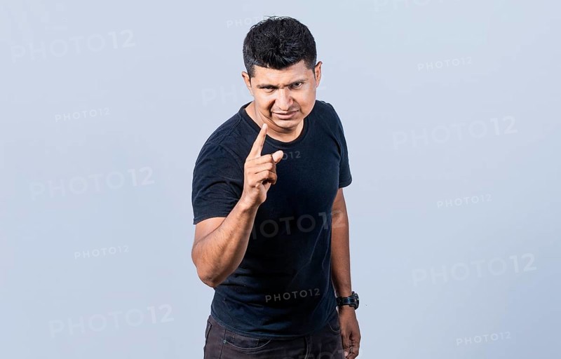 Concept of angry person threatening head on