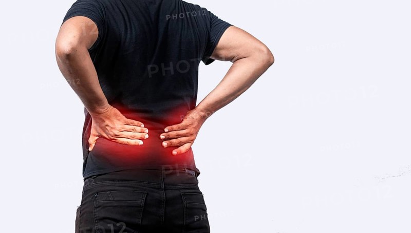 A sore man with back pain
