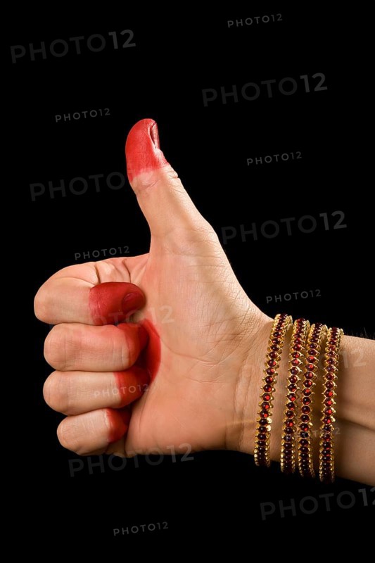 Woman hand showing Shikhara hasta