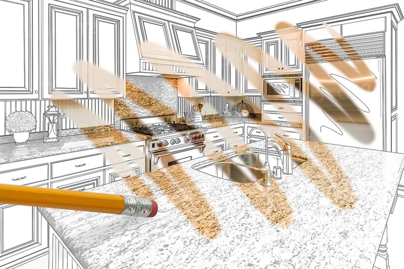 Pencil erasing drawing to reveal finished custom kitchen design photograph