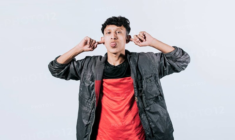 Person sticking out tongue making fun