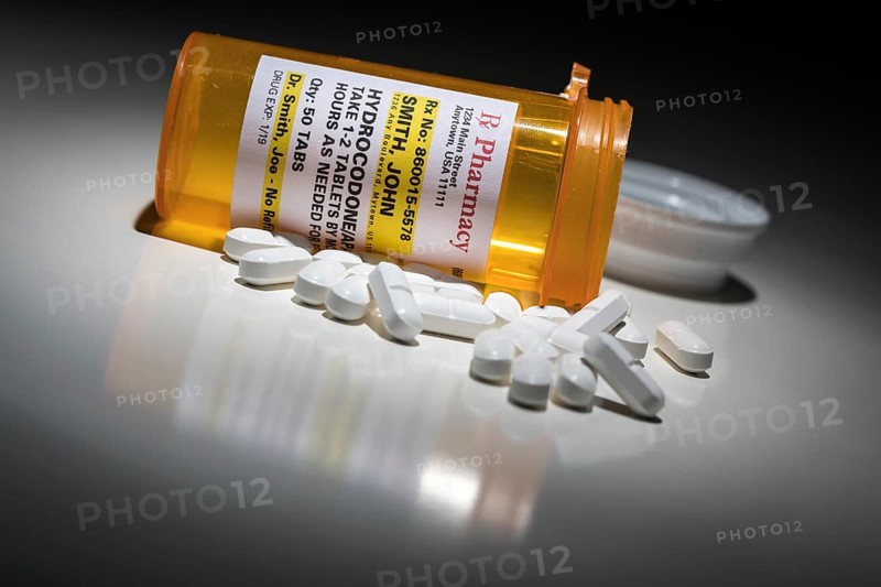 Hydrocodone pills and prescription bottle with non proprietary label. no model release required