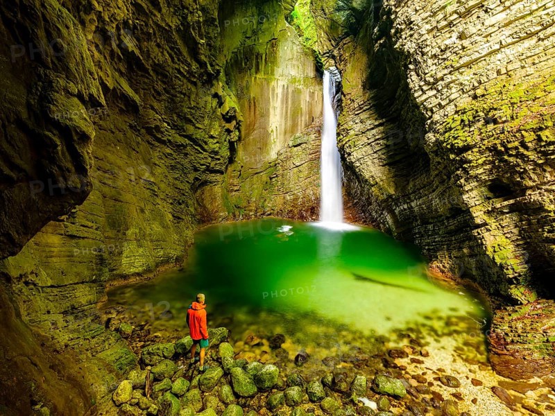 Person in front of Kozjak waterfall