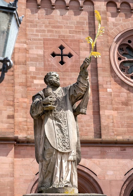Sculpture of the patron saint Marcellinus in front of the Einhard Basilica of St. Marcellinus and Peter