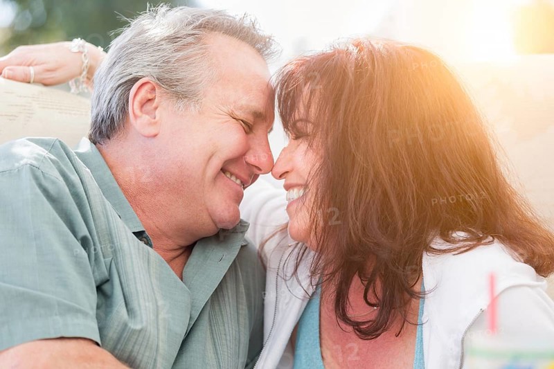Happy middle aged couple enjoy A romantic moment together outside