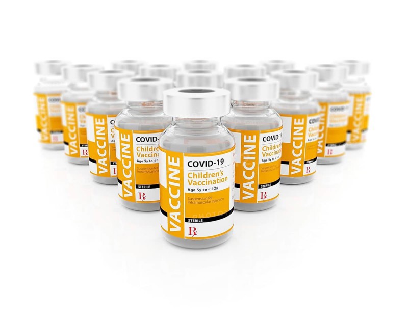 COVID-19 vaccine for children vials on white background