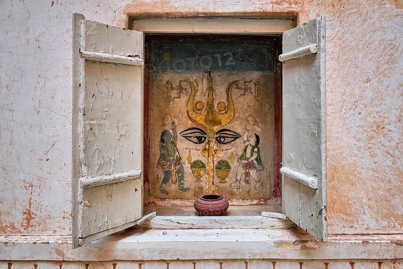 Mural with trident of the Hindu god Shiva small shrine in the Mehrangarh Fort