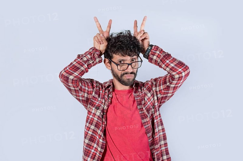 Man with fingers cuckolding