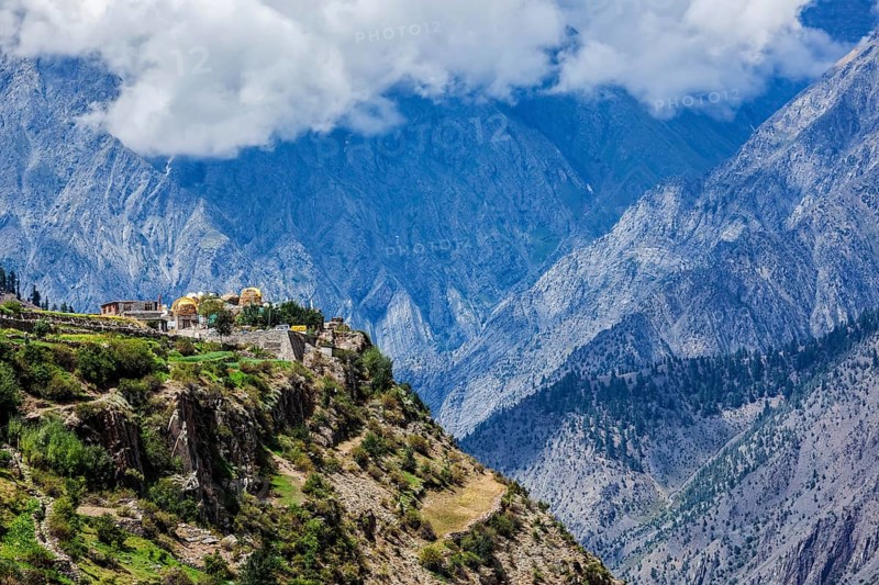 Triloknath village in Himalayas famous for Triloknath Temple with clouds. Lahaul valley