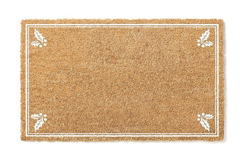 Blank holiday welcome mat with holly isolated on white background
