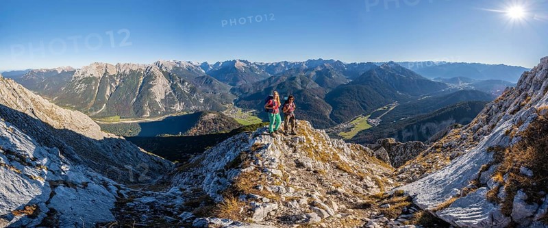 Two female hikers on a summit