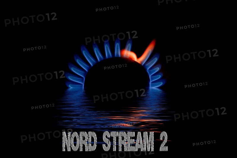 Blue gas flame reflected in the water