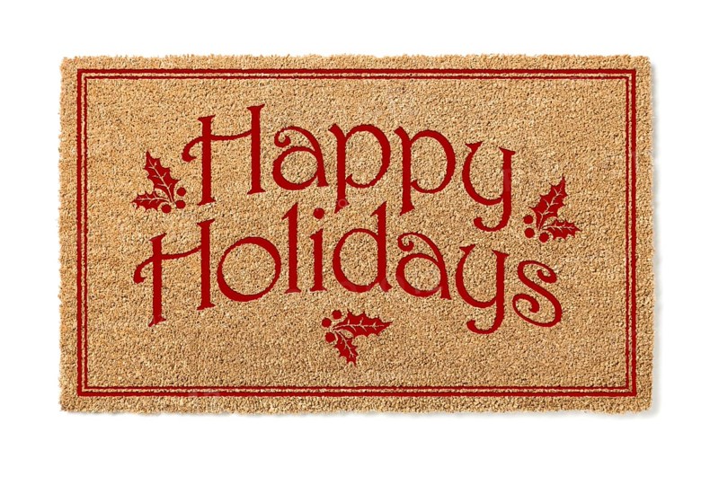 Happy holidays christmas tan welcome mat isolated on white background