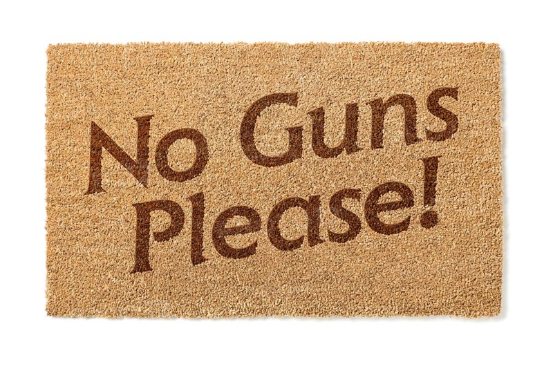 No guns please welcome mat isolated on A white background