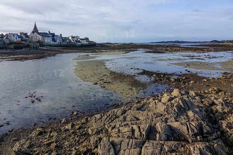 Old town of Roscoff with church Notre-Dame-de-Croaz-Batz at low tide