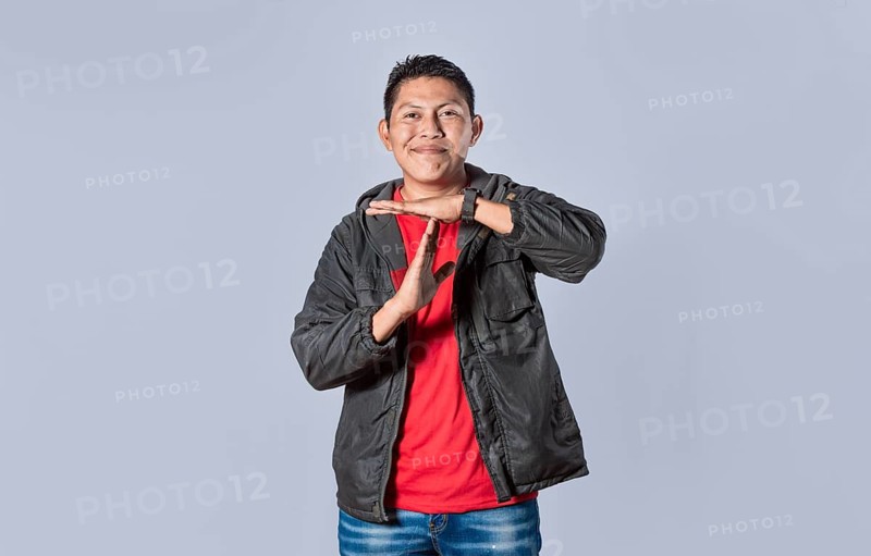 Man making time out gesture