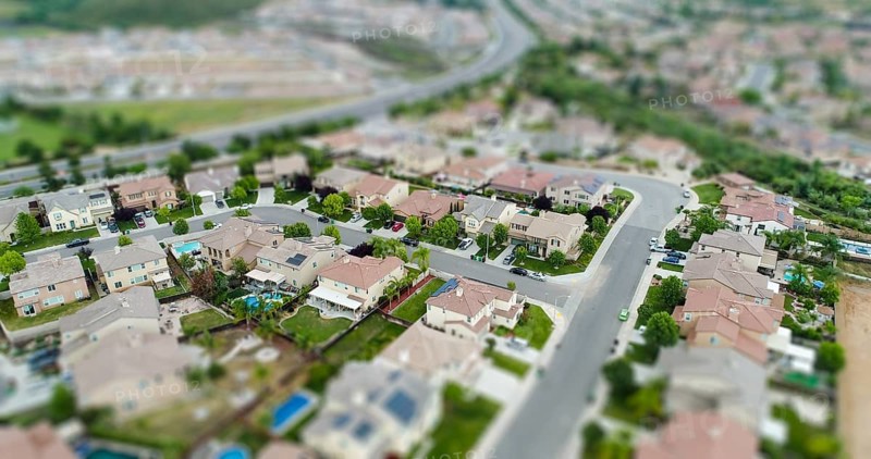 Aerial view of populated neigborhood of houses with tilt-shift blur
