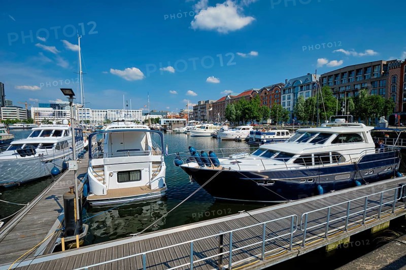Yachts and boats moored in Willemdock in Antwerp. View of Bonapartedok harbor. Antwerpen