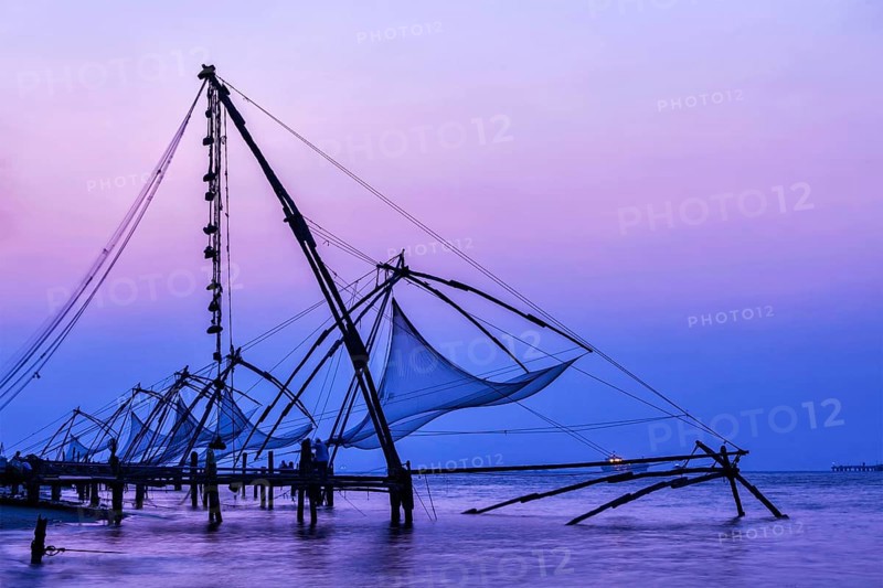 Kochi chinese fishnets on sunset in Fort Kochin