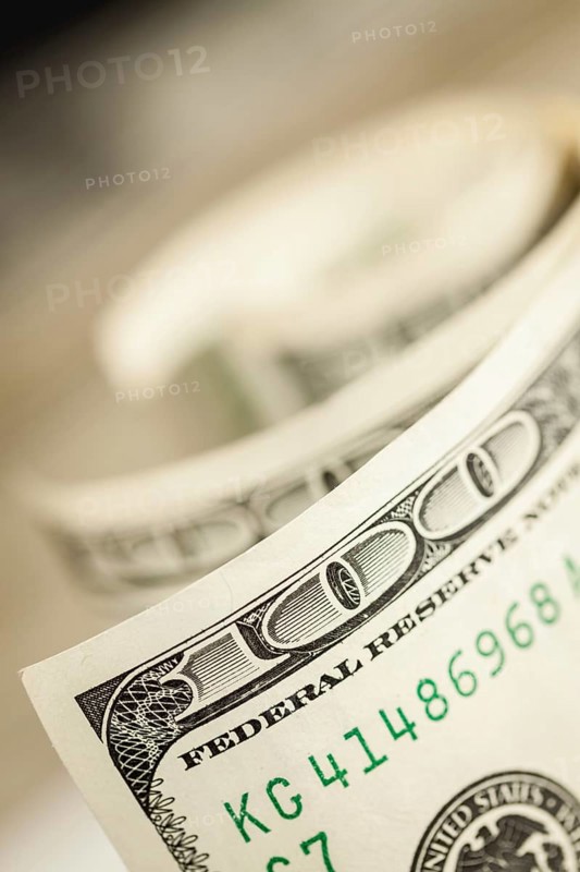 Abstract of one hundred dollar bills