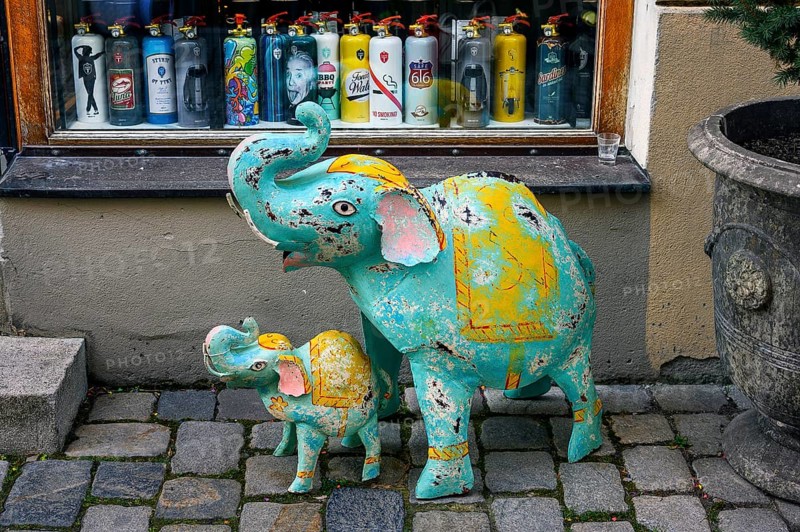 Two tin elephants