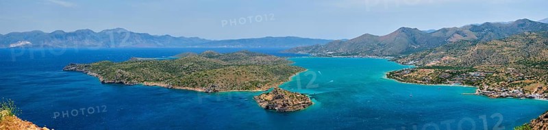 Panorama of Island of Spinalonga with old fortress former leper colony and the bay of Elounda