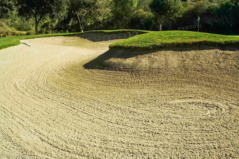 Abstract of golf course and sand bunker