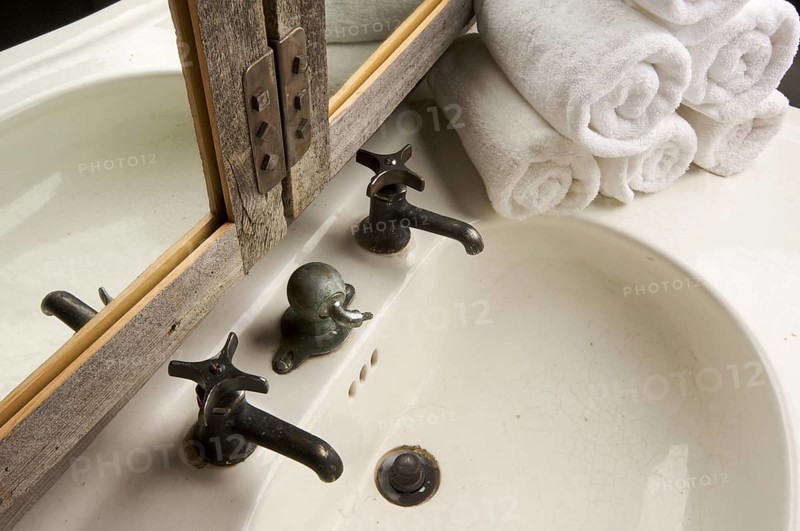 Rustic bathroom sink and mirror