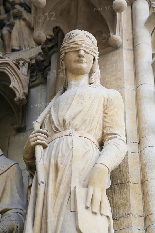 Figure of the Synagoga on the facade of Saint-Etienne Cathedral or St. Stephen's Cathedral