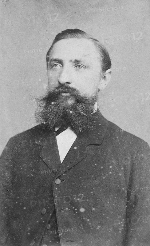 Elderly man with full beard