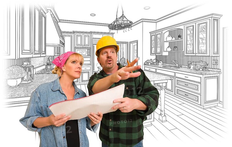 Contractor talking with customer over custom kitchen drawing