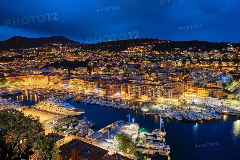 View of Old Port of Nice with luxury yacht boats from Castle Hill
