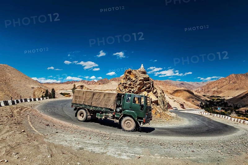 Indian army lorry truck car on national highway Srinagar-Leh NH-1 in Himalayas