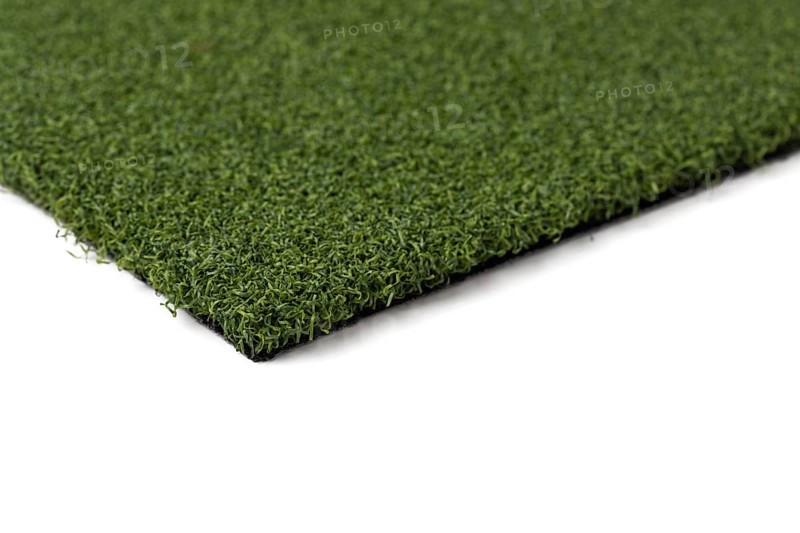 Section of artificial turf grass on white background