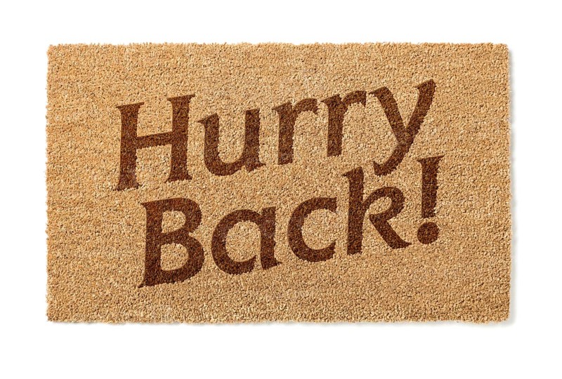Hurry back welcome mat isolated on A white background