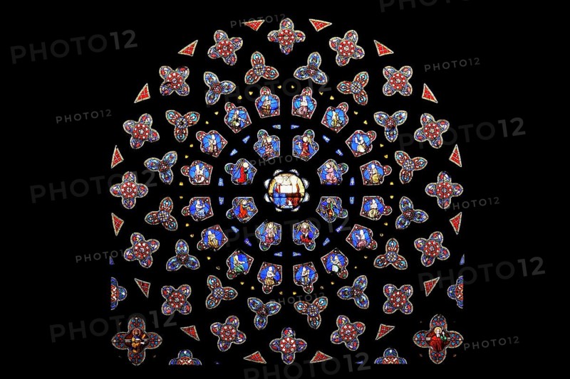 Rose window of the south transept with 19th century leaded glass windows