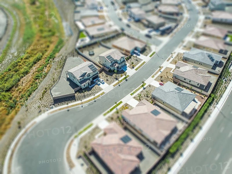 Aerial view of populated neigborhood of houses with tilt-shift blur