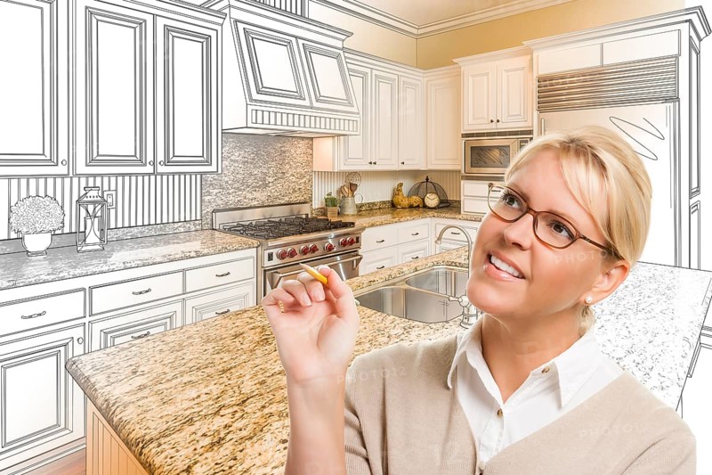 Creative woman with pencil over custom kitchen design drawing and photo combination