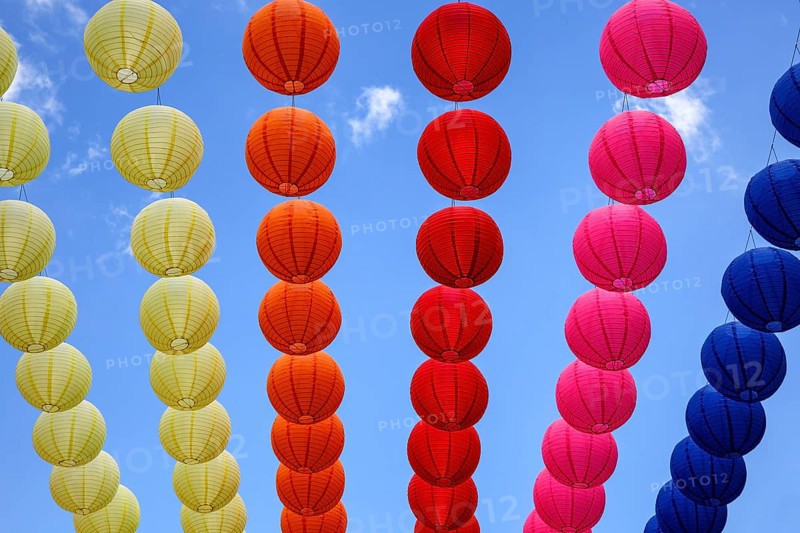 Colourful lanterns strung across the street