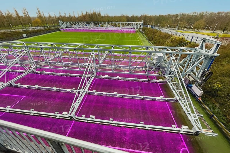 Fully automatic movable LED lighting system for turf growth lighting of stadium driven turf football pitch playing field of Bundesliga club football club FC Schalke 04