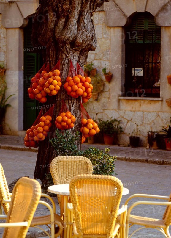 Comfortable sitting-room furniture in a street cafe Valldemossa Majorca Spain Comfortable living-room furniture in a street cafe Valldemossa Majorca Spain