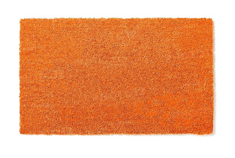 Blank orange welcome mat isolated on white background ready for your own text
