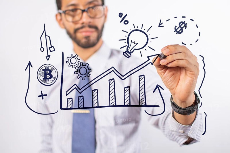 Business man drawing finance