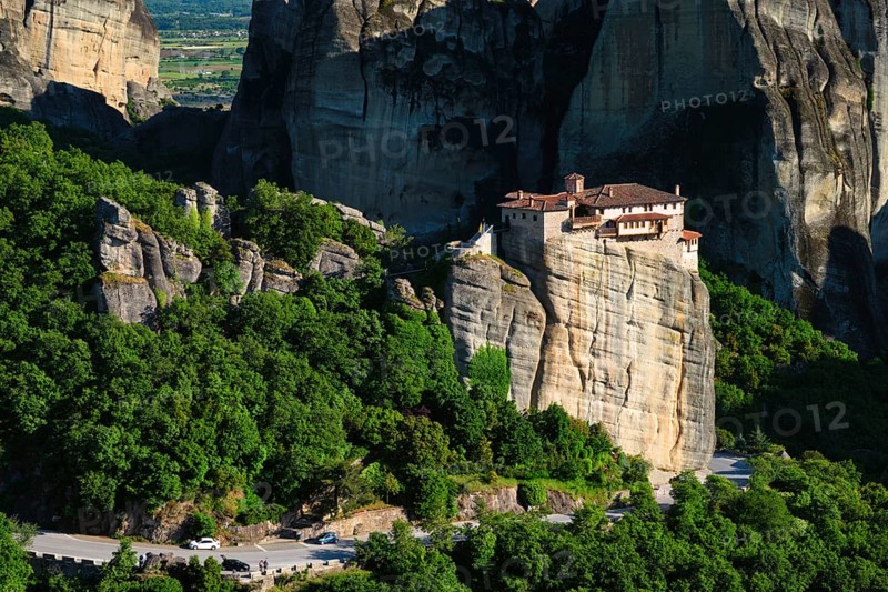 Monastery of Rousanou in famous greek tourist destination Meteora in Greece on sunset with scenic landscape