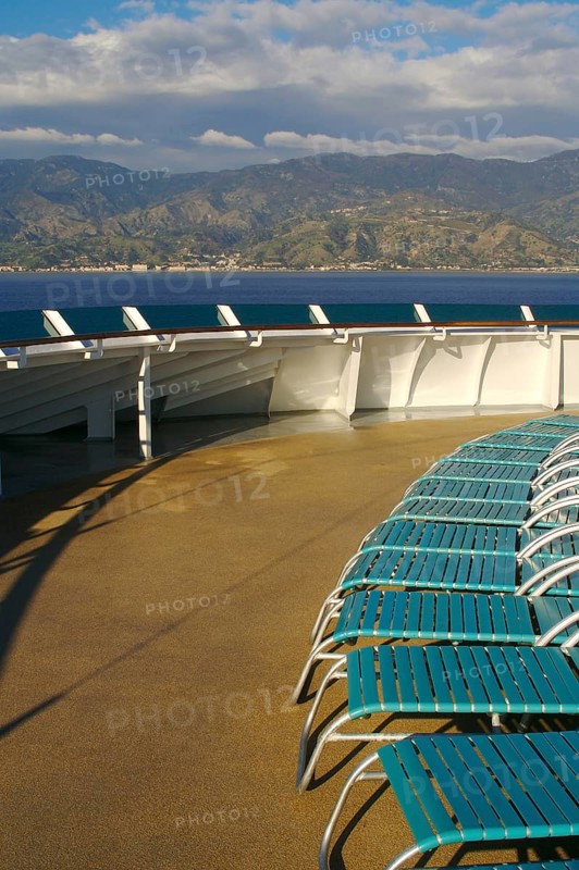 Cruise ship deck abstract shot with deck chairs