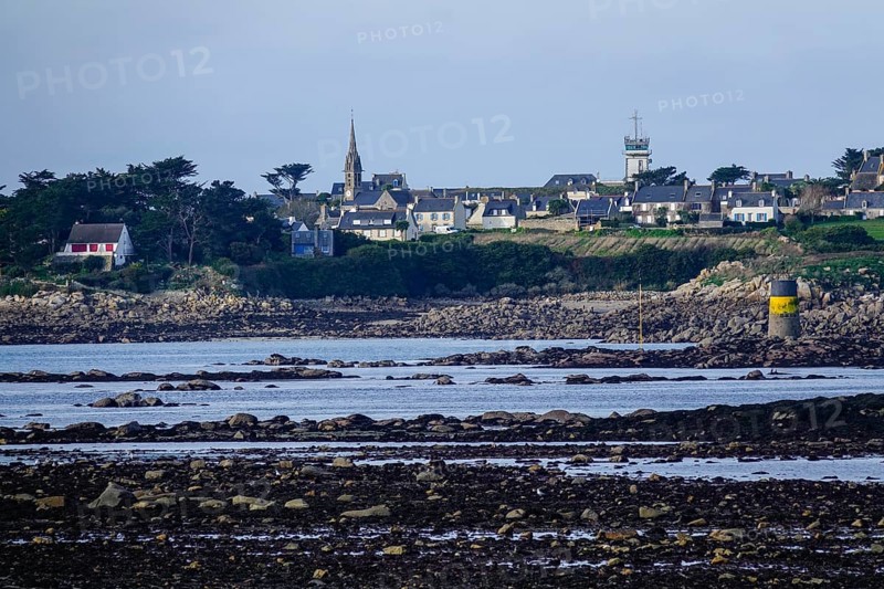 View at low tide from Roscoff to the island Ile de Batz with church