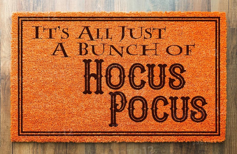 It's all A bunch of hocus pocus halloween orange welcome mat on wood floor background