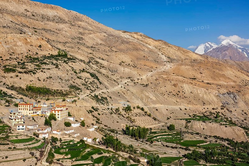 New Dhankar gompa monastery and Dhankar village on sunset